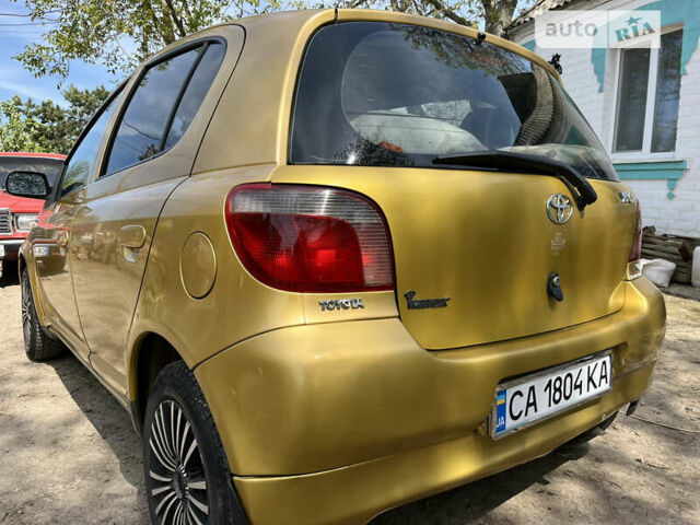 Желтый Тойота Ярис, объемом двигателя 1.3 л и пробегом 250 тыс. км за 3500 $, фото 6 на Automoto.ua