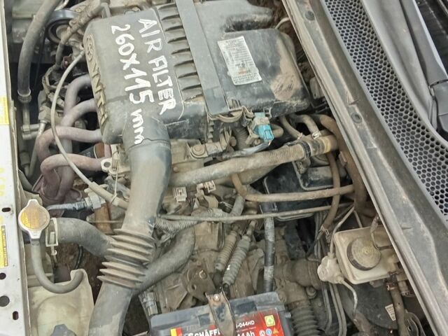 Серый Тойота Ярис, объемом двигателя 1 л и пробегом 150 тыс. км за 1900 $, фото 6 на Automoto.ua