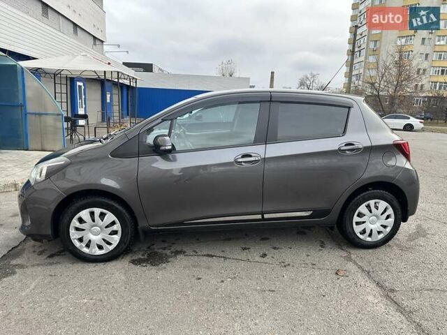 Серый Тойота Ярис, объемом двигателя 1.33 л и пробегом 166 тыс. км за 10500 $, фото 7 на Automoto.ua