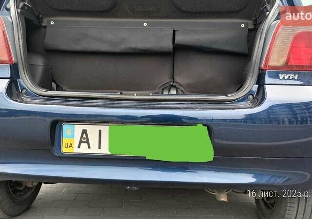 Синий Тойота Ярис, объемом двигателя 1 л и пробегом 270 тыс. км за 5200 $, фото 101 на Automoto.ua