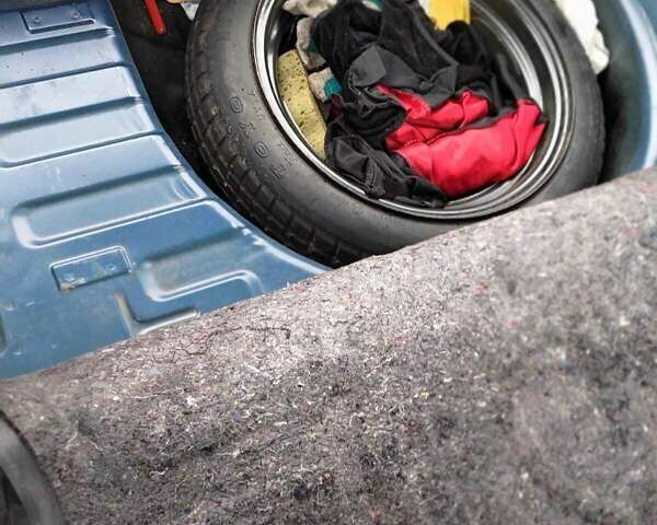 Синий Тойота Ярис, объемом двигателя 1 л и пробегом 270 тыс. км за 5200 $, фото 86 на Automoto.ua