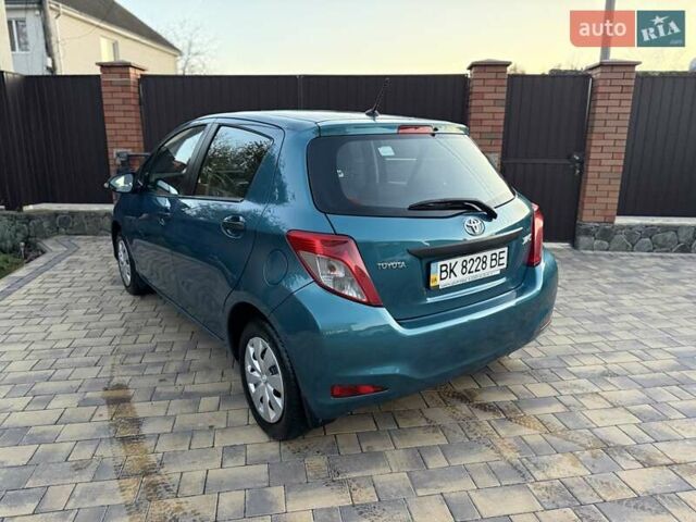 Зеленый Тойота Ярис, объемом двигателя 1 л и пробегом 60 тыс. км за 6200 $, фото 14 на Automoto.ua