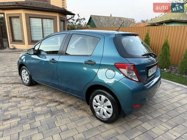 Зеленый Тойота Ярис, объемом двигателя 1 л и пробегом 60 тыс. км за 6200 $, фото 5 на Automoto.ua