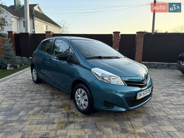 Зеленый Тойота Ярис, объемом двигателя 1 л и пробегом 60 тыс. км за 6200 $, фото 18 на Automoto.ua