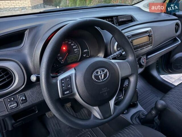 Зеленый Тойота Ярис, объемом двигателя 1 л и пробегом 60 тыс. км за 6200 $, фото 47 на Automoto.ua