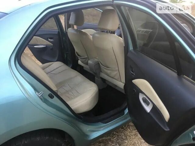 Зелений Тойота Яріс, об'ємом двигуна 1.3 л та пробігом 236 тис. км за 6366 $, фото 6 на Automoto.ua