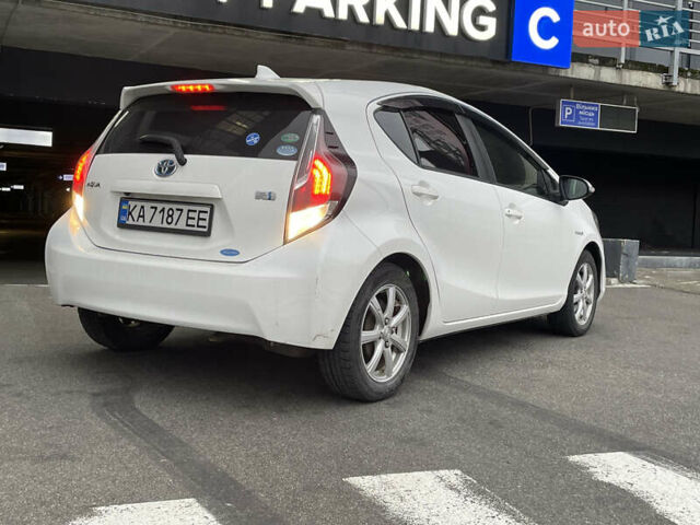 Білий Тойота Aqua, об'ємом двигуна 1.5 л та пробігом 123 тис. км за 9900 $, фото 9 на Automoto.ua