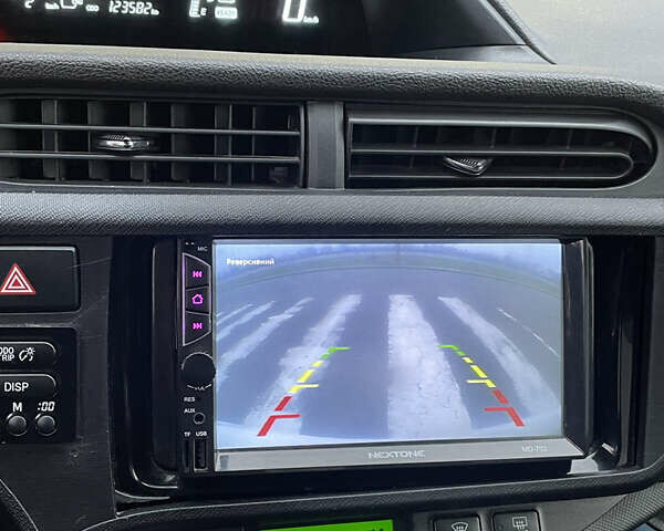 Білий Тойота Aqua, об'ємом двигуна 1.5 л та пробігом 123 тис. км за 9900 $, фото 16 на Automoto.ua