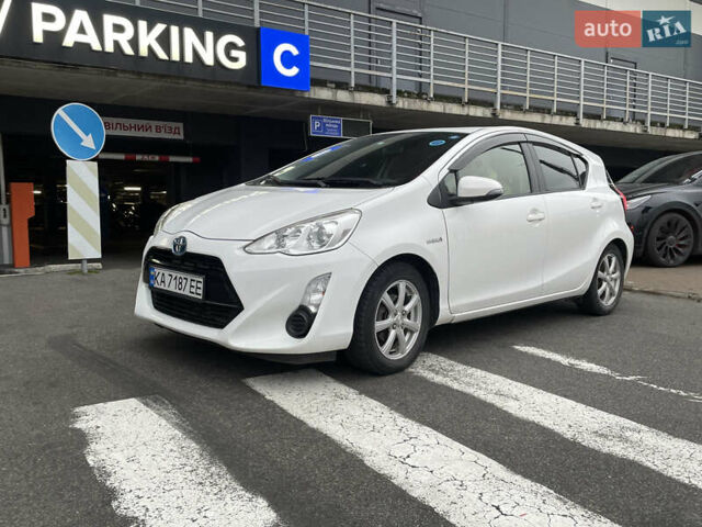 Білий Тойота Aqua, об'ємом двигуна 1.5 л та пробігом 123 тис. км за 9900 $, фото 2 на Automoto.ua