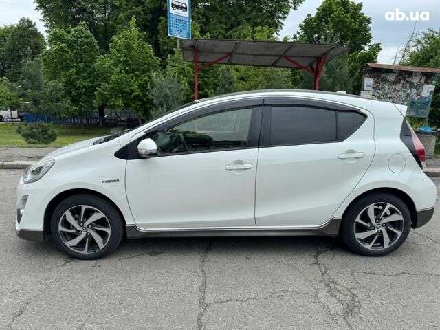 Білий Тойота Aqua, об'ємом двигуна 1.5 л та пробігом 95 тис. км за 11990 $, фото 6 на Automoto.ua