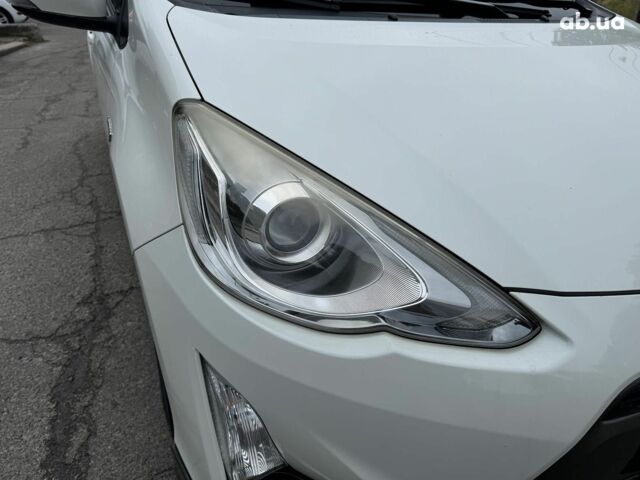 Білий Тойота Aqua, об'ємом двигуна 1.5 л та пробігом 95 тис. км за 11990 $, фото 16 на Automoto.ua