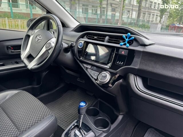 Білий Тойота Aqua, об'ємом двигуна 1.5 л та пробігом 95 тис. км за 11990 $, фото 13 на Automoto.ua