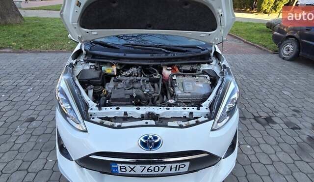 Белый Тойота Aqua, объемом двигателя 1.5 л и пробегом 51 тыс. км за 12800 $, фото 25 на Automoto.ua