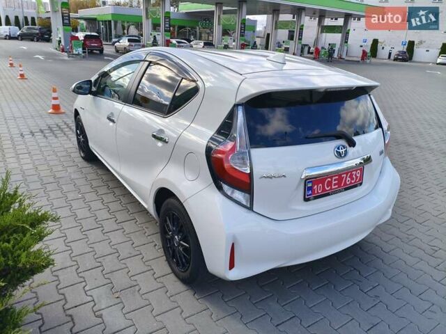 Белый Тойота Aqua, объемом двигателя 1.5 л и пробегом 73 тыс. км за 12900 $, фото 7 на Automoto.ua