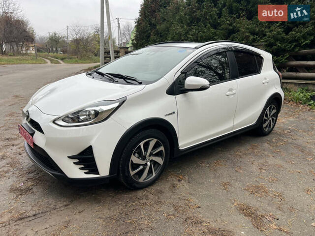 Белый Тойота Aqua, объемом двигателя 1.5 л и пробегом 61 тыс. км за 13200 $, фото 12 на Automoto.ua