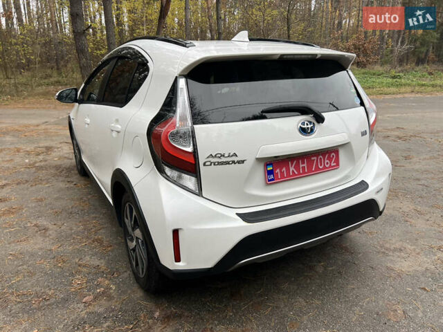 Белый Тойота Aqua, объемом двигателя 1.5 л и пробегом 61 тыс. км за 13200 $, фото 9 на Automoto.ua