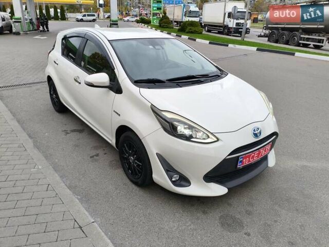 Белый Тойота Aqua, объемом двигателя 1.5 л и пробегом 73 тыс. км за 12900 $, фото 36 на Automoto.ua