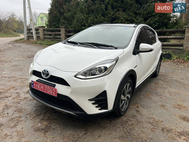 Белый Тойота Aqua, объемом двигателя 1.5 л и пробегом 61 тыс. км за 13200 $, фото 1 на Automoto.ua