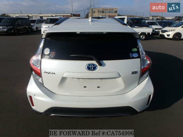 Белый Тойота Aqua, объемом двигателя 1.5 л и пробегом 79 тыс. км за 12700 $, фото 3 на Automoto.ua
