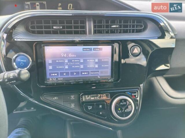 Белый Тойота Aqua, объемом двигателя 1.5 л и пробегом 73 тыс. км за 12900 $, фото 28 на Automoto.ua