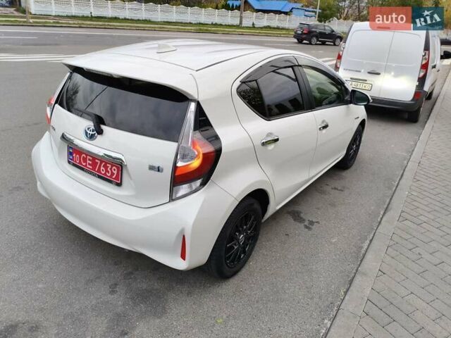 Белый Тойота Aqua, объемом двигателя 1.5 л и пробегом 73 тыс. км за 12900 $, фото 37 на Automoto.ua