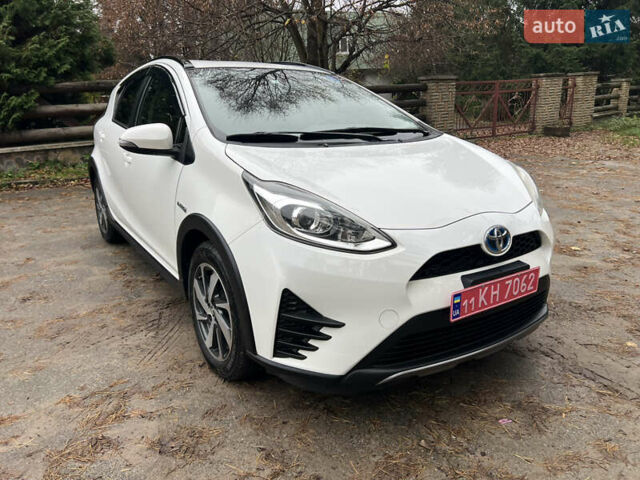 Белый Тойота Aqua, объемом двигателя 1.5 л и пробегом 61 тыс. км за 13200 $, фото 3 на Automoto.ua