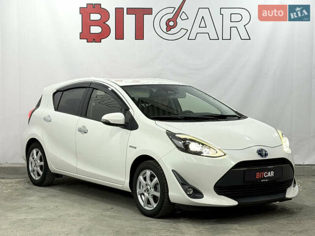 Білий Тойота Aqua, об'ємом двигуна 1.5 л та пробігом 87 тис. км за 13200 $, фото 1 на Automoto.ua