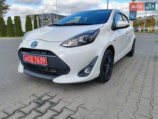 Белый Тойота Aqua, объемом двигателя 1.5 л и пробегом 73 тыс. км за 12900 $, фото 11 на Automoto.ua