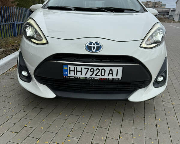 Білий Тойота Aqua, об'ємом двигуна 1.5 л та пробігом 86 тис. км за 12800 $, фото 1 на Automoto.ua