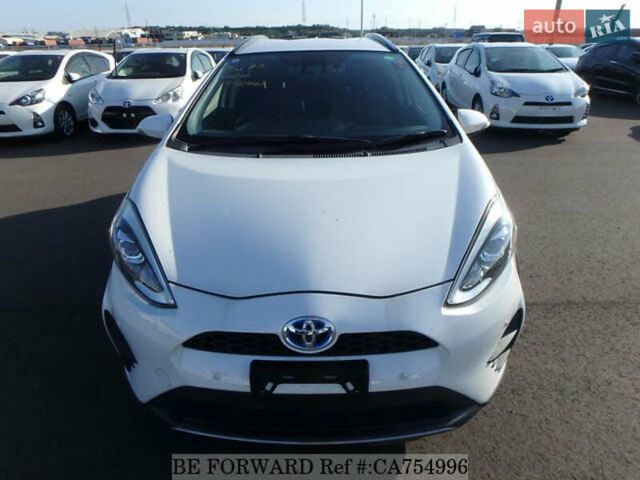 Белый Тойота Aqua, объемом двигателя 1.5 л и пробегом 79 тыс. км за 12700 $, фото 7 на Automoto.ua