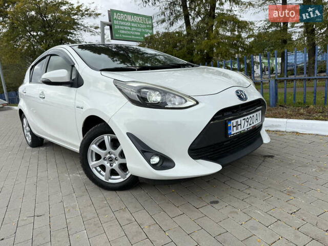 Білий Тойота Aqua, об'ємом двигуна 1.5 л та пробігом 86 тис. км за 12800 $, фото 23 на Automoto.ua