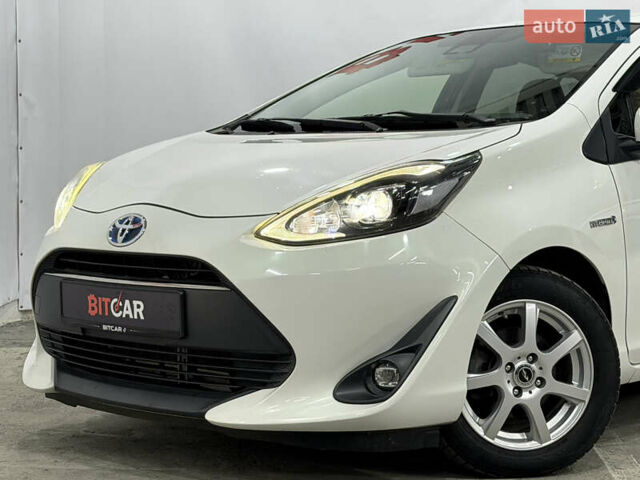 Білий Тойота Aqua, об'ємом двигуна 1.5 л та пробігом 87 тис. км за 13200 $, фото 8 на Automoto.ua