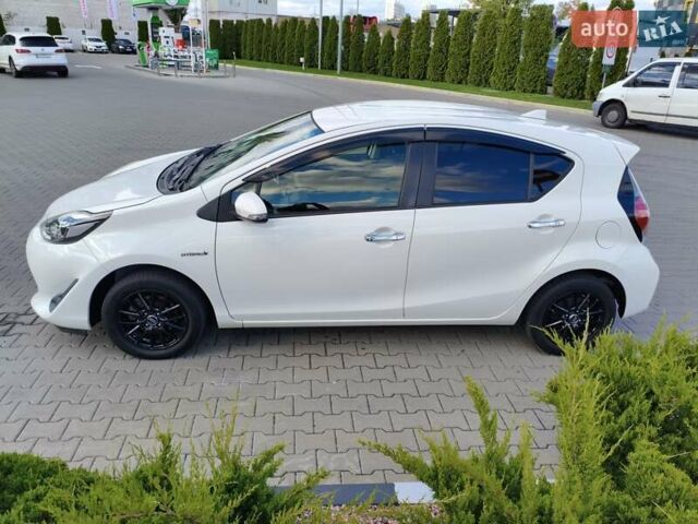 Белый Тойота Aqua, объемом двигателя 1.5 л и пробегом 73 тыс. км за 12900 $, фото 9 на Automoto.ua