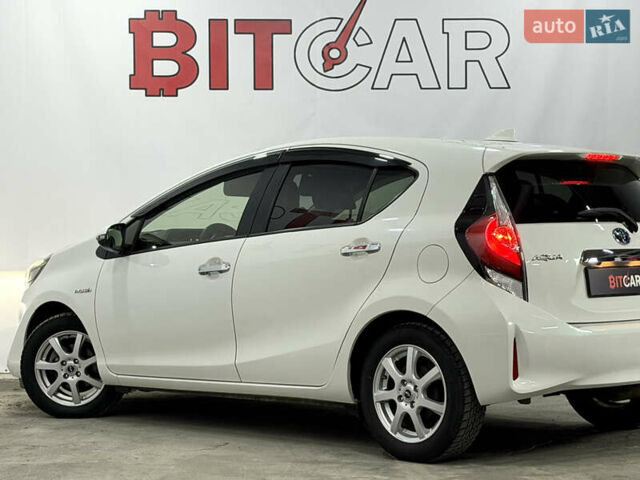 Білий Тойота Aqua, об'ємом двигуна 1.5 л та пробігом 87 тис. км за 13200 $, фото 20 на Automoto.ua