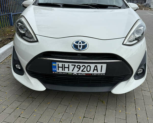 Білий Тойота Aqua, об'ємом двигуна 1.5 л та пробігом 86 тис. км за 12800 $, фото 18 на Automoto.ua