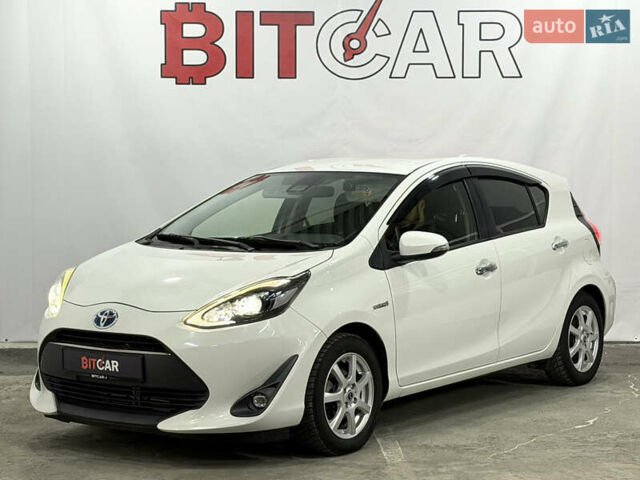 Білий Тойота Aqua, об'ємом двигуна 1.5 л та пробігом 87 тис. км за 13200 $, фото 6 на Automoto.ua