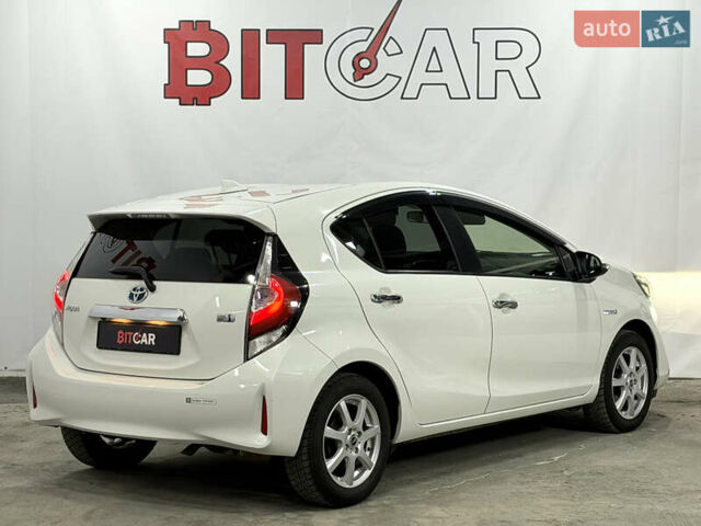 Білий Тойота Aqua, об'ємом двигуна 1.5 л та пробігом 87 тис. км за 13200 $, фото 9 на Automoto.ua