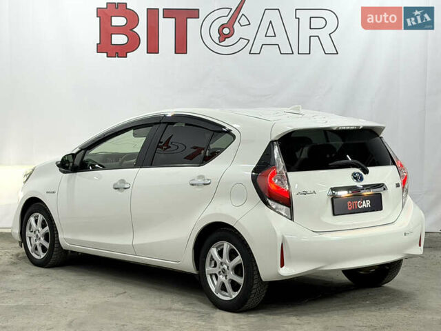 Білий Тойота Aqua, об'ємом двигуна 1.5 л та пробігом 87 тис. км за 13200 $, фото 18 на Automoto.ua
