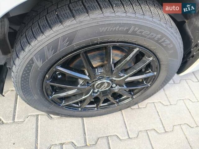 Белый Тойота Aqua, объемом двигателя 1.5 л и пробегом 73 тыс. км за 12900 $, фото 26 на Automoto.ua