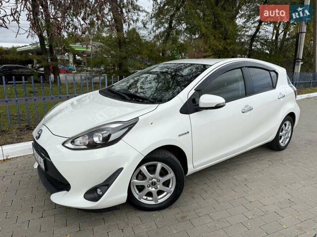 Білий Тойота Aqua, об'ємом двигуна 1.5 л та пробігом 86 тис. км за 12800 $, фото 2 на Automoto.ua