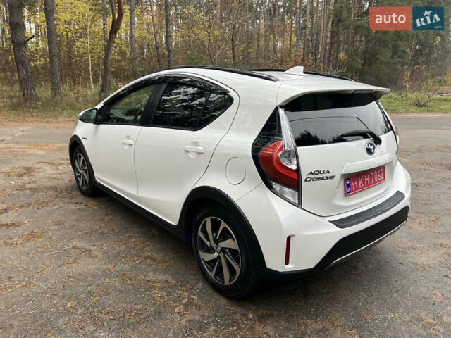 Белый Тойота Aqua, объемом двигателя 1.5 л и пробегом 61 тыс. км за 13200 $, фото 10 на Automoto.ua