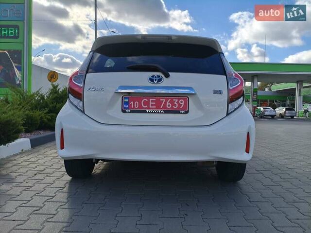 Белый Тойота Aqua, объемом двигателя 1.5 л и пробегом 73 тыс. км за 12900 $, фото 6 на Automoto.ua