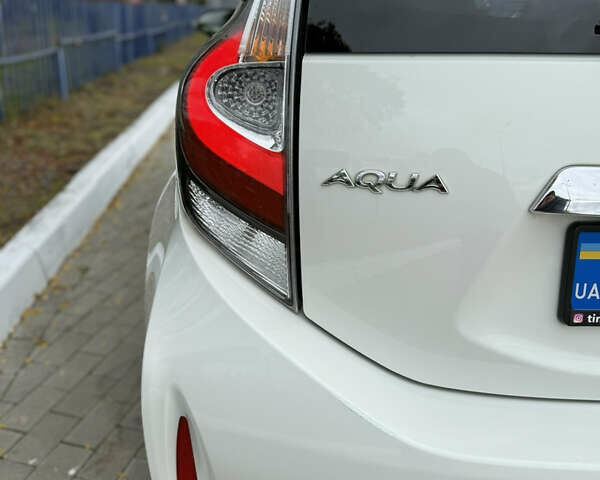 Білий Тойота Aqua, об'ємом двигуна 1.5 л та пробігом 86 тис. км за 12800 $, фото 33 на Automoto.ua