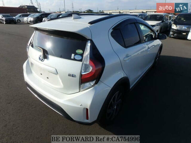 Белый Тойота Aqua, объемом двигателя 1.5 л и пробегом 79 тыс. км за 12700 $, фото 4 на Automoto.ua