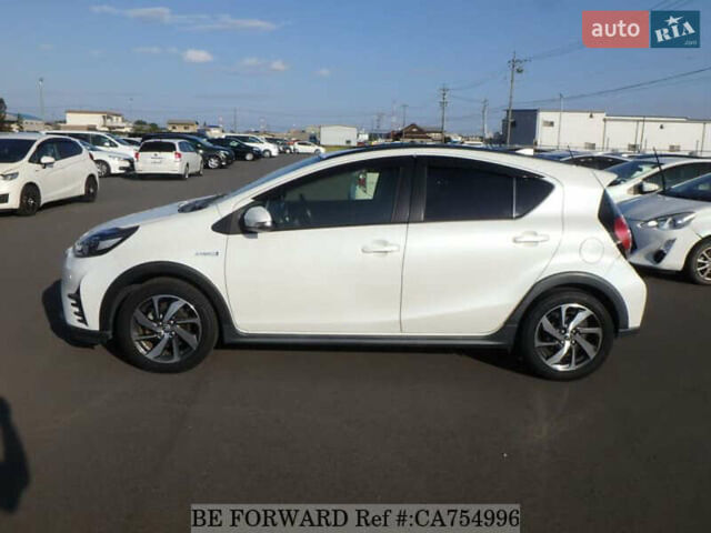 Белый Тойота Aqua, объемом двигателя 1.5 л и пробегом 79 тыс. км за 12700 $, фото 1 на Automoto.ua