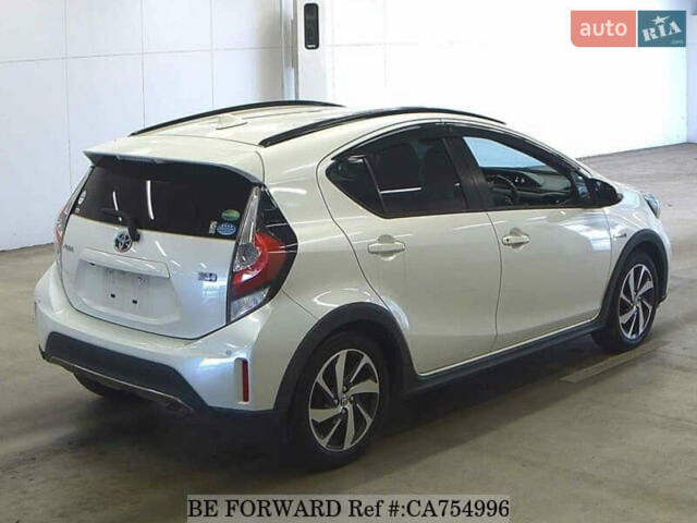 Белый Тойота Aqua, объемом двигателя 1.5 л и пробегом 79 тыс. км за 12700 $, фото 47 на Automoto.ua