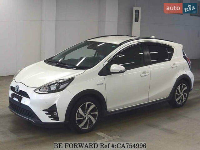 Белый Тойота Aqua, объемом двигателя 1.5 л и пробегом 79 тыс. км за 12700 $, фото 46 на Automoto.ua