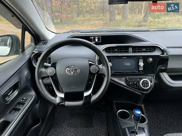 Белый Тойота Aqua, объемом двигателя 1.5 л и пробегом 61 тыс. км за 13200 $, фото 21 на Automoto.ua