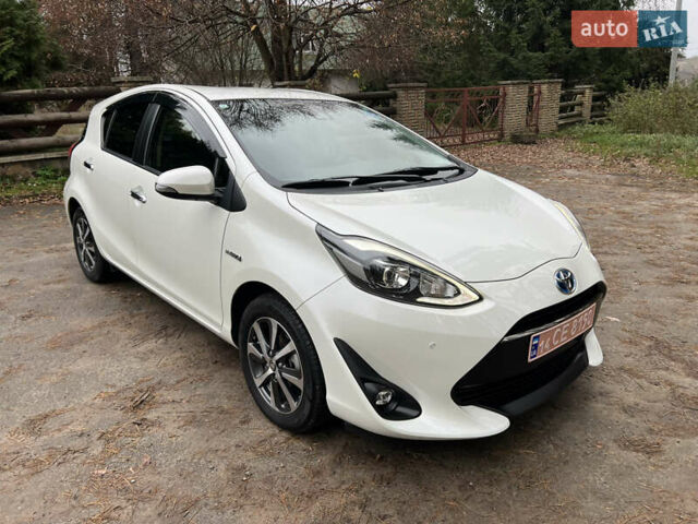 Білий Тойота Aqua, об'ємом двигуна 1.5 л та пробігом 61 тис. км за 13200 $, фото 5 на Automoto.ua