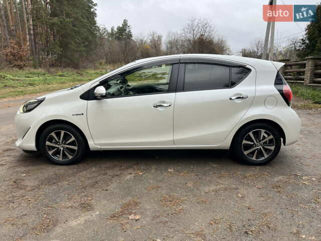 Білий Тойота Aqua, об'ємом двигуна 1.5 л та пробігом 61 тис. км за 13200 $, фото 13 на Automoto.ua